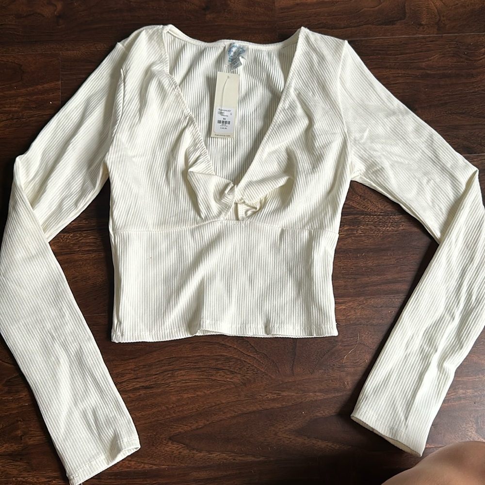 Cream long sleeve top